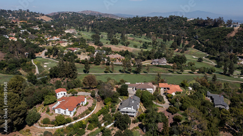 Afternoon aerial view of the sprawling neighborhood houses and hills of La Habra Heights, California, USA. photo