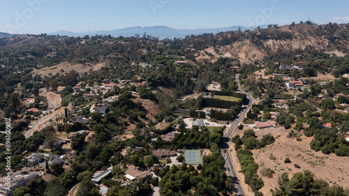 Wallpaper Mural Afternoon aerial view of the sprawling neighborhood houses and hills of La Habra Heights, California, USA. Torontodigital.ca