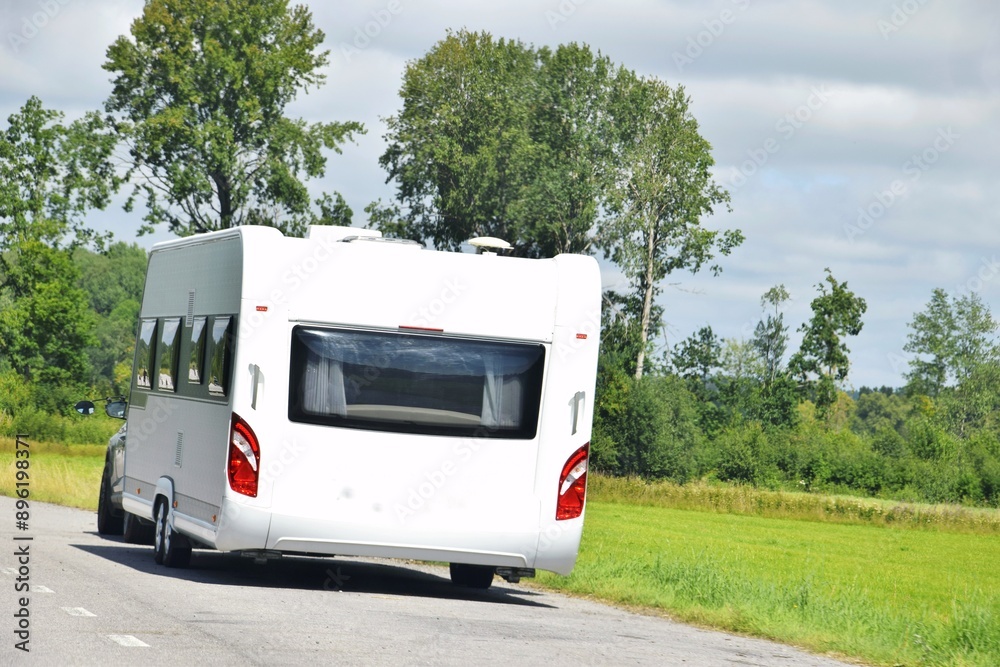 Naklejka premium The trailer is driving on the highway.