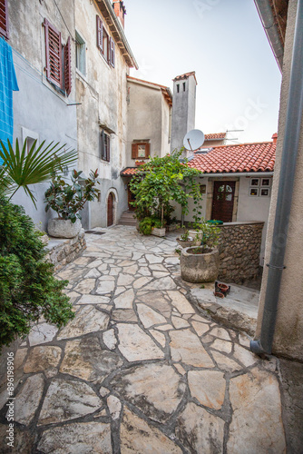 Fototapeta Naklejka Na Ścianę i Meble -  Old, historic, dreamy mountain village. Narrow streets, old houses in a romantic setting. Beautifully landscaped place with small paths and squares Mošćenice, Moscenicka Draga, Istria, Croatia