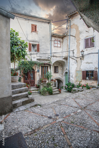 Fototapeta Naklejka Na Ścianę i Meble -  Old, historic, dreamy mountain village. Narrow streets, old houses in a romantic setting. Beautifully landscaped place with small paths and squares Mošćenice, Moscenicka Draga, Istria, Croatia