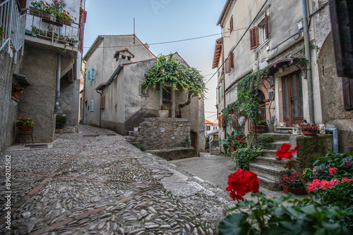 Fototapeta Naklejka Na Ścianę i Meble -  Old, historic, dreamy mountain village. Narrow streets, old houses in a romantic setting. Beautifully landscaped place with small paths and squares Mošćenice, Moscenicka Draga, Istria, Croatia