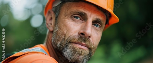 A Construction Worker With A Hard Hat Epitomizes Safety And Professionalism photo