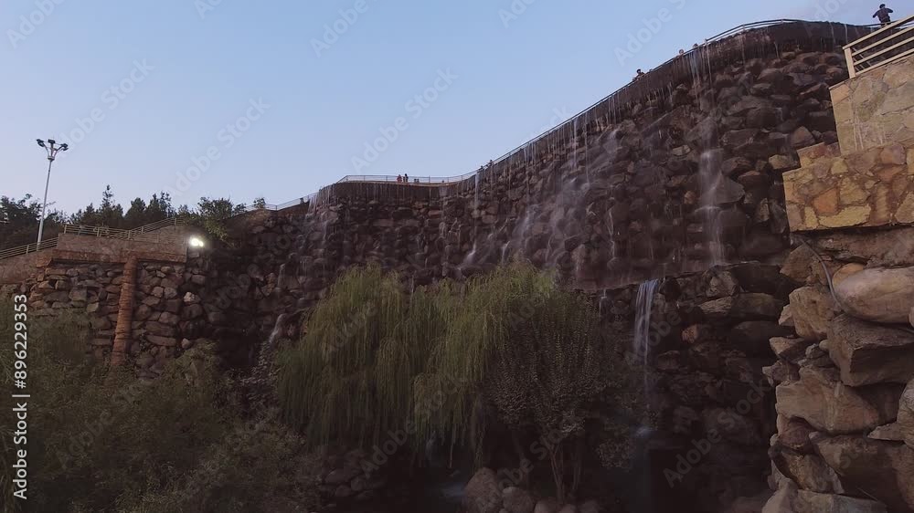 Dushanbe, Tajikistan - 11th november, 2023: Time lapse of Artificial waterfall in the city center of Dushanbe, the Capital of Tajikistan Dushanbe, Tajikistan - 11th november, 2023: Time lapse of Artificial waterfall in the city center of Dushanbe, the Capital of Tajikistan