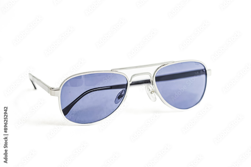 Silver Aviator Sunglasses with Blue Lenses Isolated on White Background Silver Aviator Sunglasses with Blue Lenses Isolated on White Background