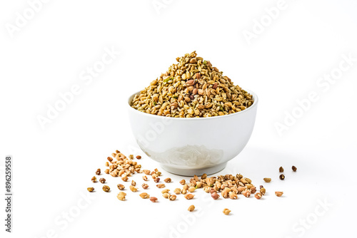 Bowl of Buckwheat Groats on White Background