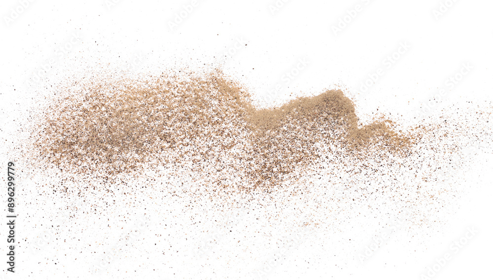 Minced black pepper, ground peppercorn pile flying isolated on white, macro Minced black pepper, ground peppercorn pile flying isolated on white, macro