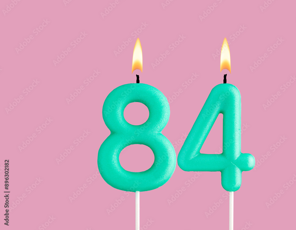 Birthday card with green number 84 candle - Pastel pink background Birthday card with green number 84 candle - Pastel pink background