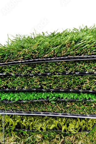Close up of the artificial grass turf samples isolated on white