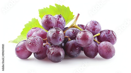 A bunch of ripe juicy purple grapes with green leaves isolated on a white background. photo