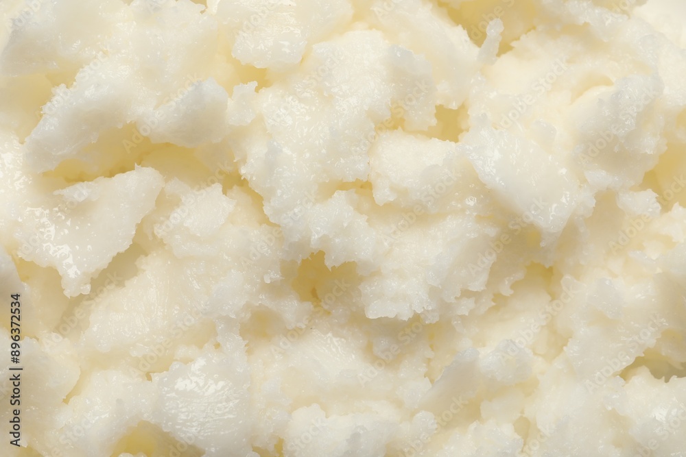 Natural shea butter as background, top view Natural shea butter as background, top view