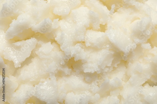 Natural shea butter as background, top view
