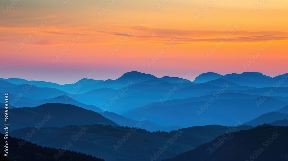 Obraz premium Variation of hues in evening sky over mountain layers
