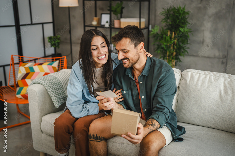 Boyfriend read greeting card thank you note from his girlfriend Boyfriend read greeting card thank you note from his girlfriend
