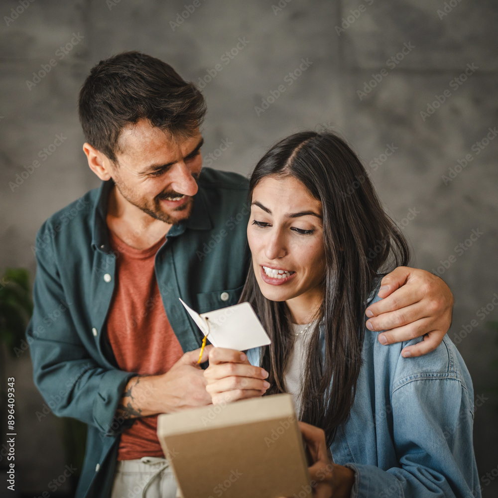 Girlfriend read greeting card thank you note from his boyfriend Girlfriend read greeting card thank you note from his boyfriend