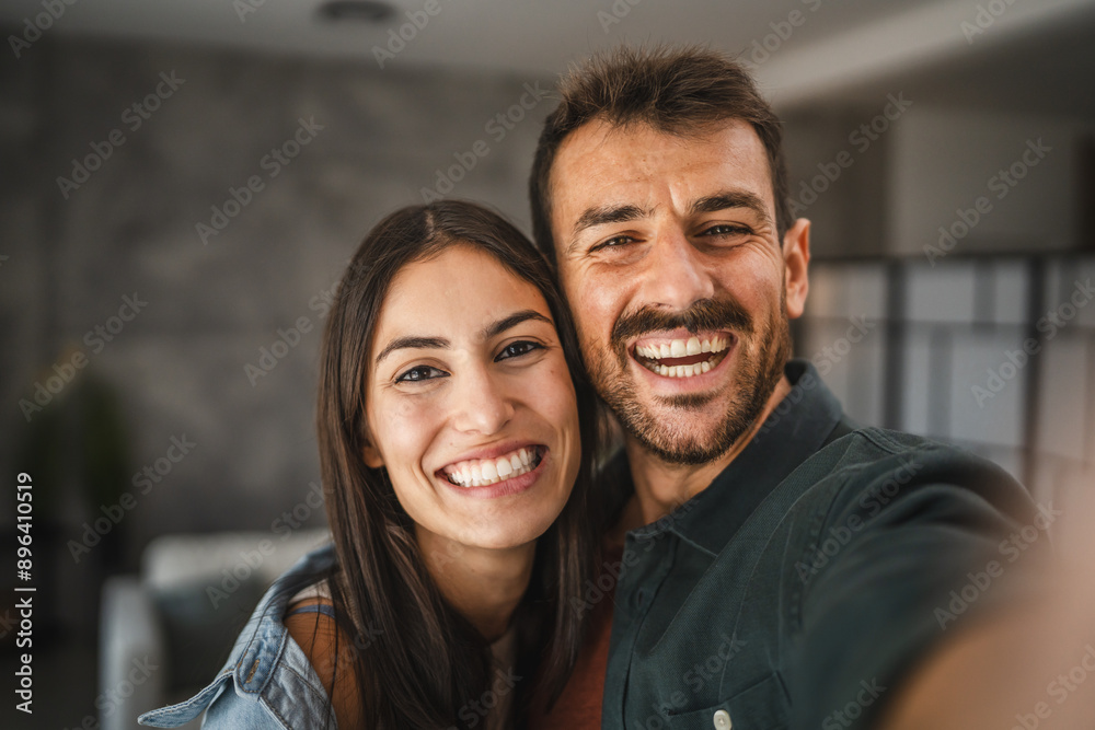 Self portrait of happy couple hug and have fun at home Self portrait of happy couple hug and have fun at home