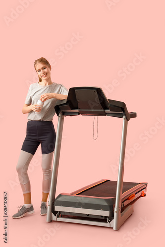 Sporty young woman with bot...