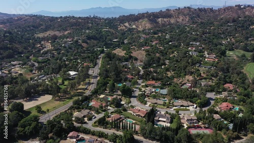 Afternoon aerial view of the sprawling neighborhood houses and hills of La Habra Heights, California, USA. photo