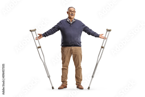 Obraz na plátně Mature man getting rid of crutches