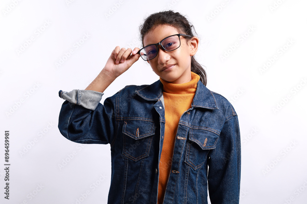 Happy young smart asian girl standing while holding her eyeglasses Happy young smart asian girl standing while holding her eyeglasses