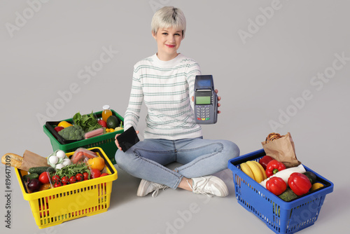 Young woman with payment te...