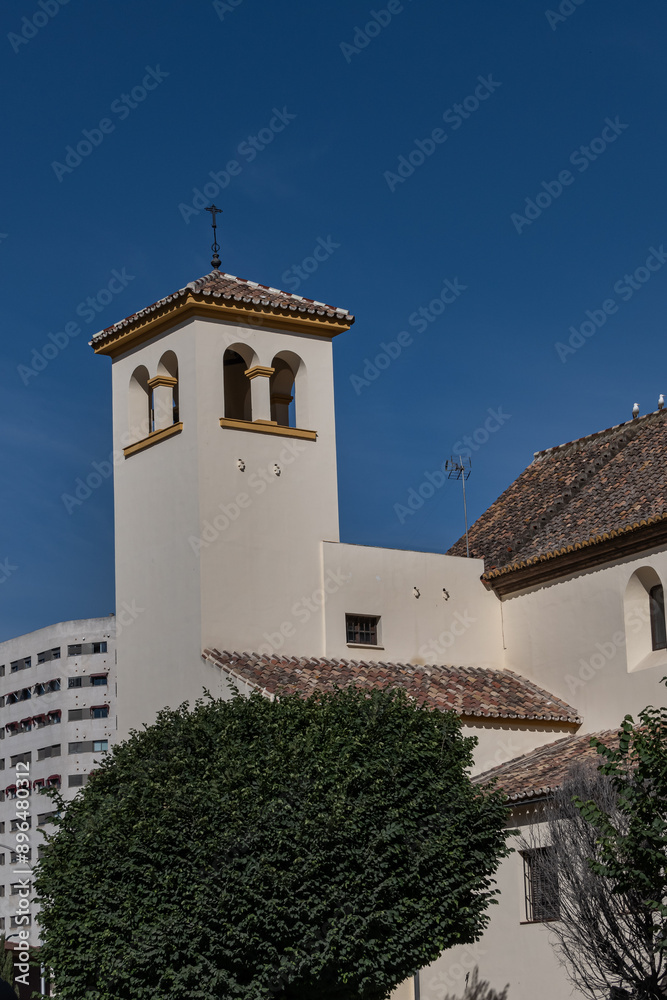 Obraz premium The Church of St. Peter (Parroquia de San Pedro) is a Catholic temple located in the old district of El Perchel. Building dates back to 1629. Malaga, Costa del Sol, Andalusia, Spain.