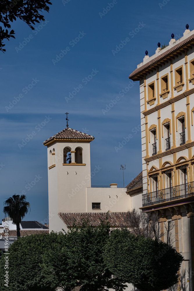 Obraz premium The Church of St. Peter (Parroquia de San Pedro) is a Catholic temple located in the old district of El Perchel. Building dates back to 1629. Malaga, Costa del Sol, Andalusia, Spain.