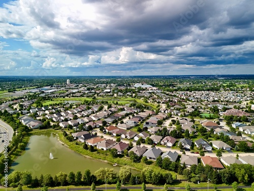 Aerial View of Sprawling Suburb in Naperville, Illinois with Pond  