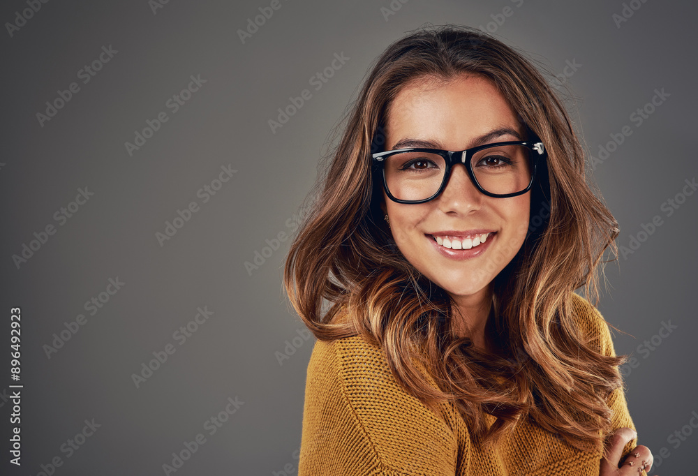 Glasses, happy and portrait of woman in studio with confidence, pride and smile on gray background. Optometry, frames and face of person with prescription lens for vision, eyesight and wellness Glasses, happy and portrait of woman in studio with confidence, pride and smile on gray background. Optometry, frames and face of person with prescription lens for vision, eyesight and wellness
