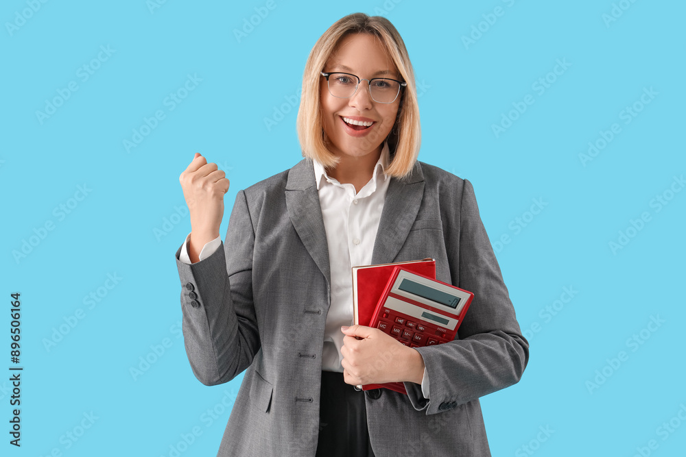 Mature female math teacher on blue background Mature female math teacher on blue background
