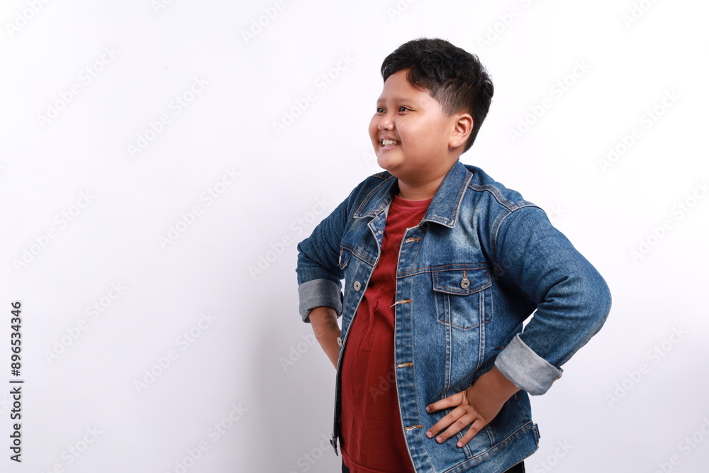 Cheerful and happy asian boy with big smile on light background Cheerful and happy asian boy with big smile on light background