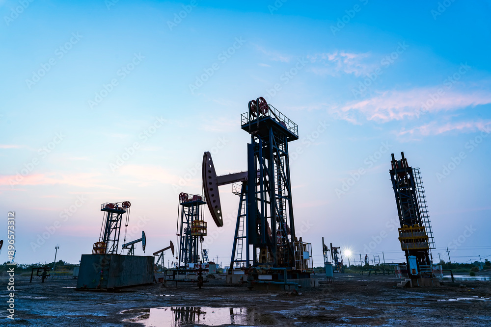 In the evening of oilfield derrick In the evening of oilfield derrick