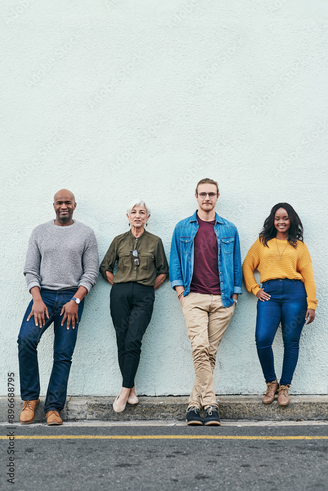 Obraz premium Creative, team and portrait of business people by wall for partnership, confidence and collaboration. Employee pride, diversity and smile for company, development and opportunity with mockup space