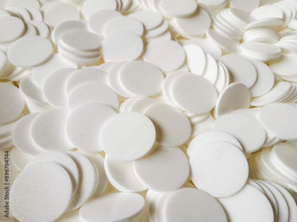 Stack of white wadding seals. Seal for bottle caps Stack of white wadding seals. Seal for bottle caps