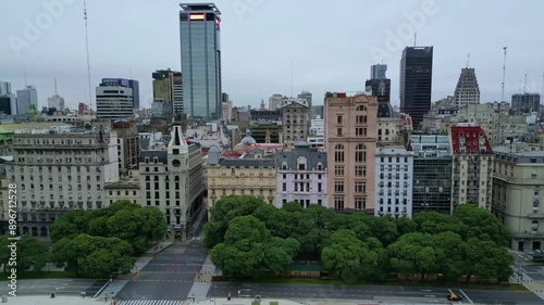 Daytime aerial view over Paseo Colon Avenue showing the buildings and architecture of the city of Buenos Aires, Argentina. Tourism in the city. photo