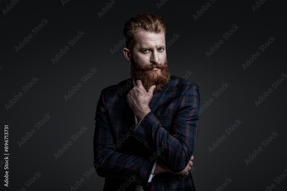 Stylish man in business suit. Businessman with beard. Brutal bearded man isolated on grey. Ambitious man in elegant suit menswear. Formal fashion for man. Suit on menswear model. Designer suit Stylish man in business suit. Businessman with beard. Brutal bearded man isolated on grey. Ambitious man in elegant suit menswear. Formal fashion for man. Suit on menswear model. Designer suit