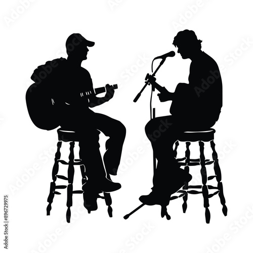 Silhouettes of two musicians playing acoustic guitars.