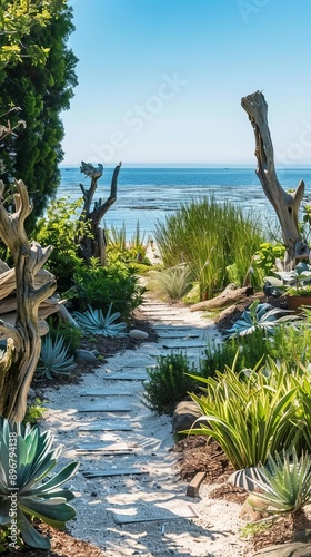 Garden design image of a coastal garden with salttolerant plants, driftwood sculptures, and sandy pathways leading to a beach view photo