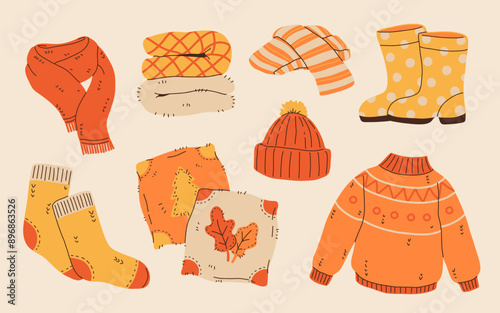 Set of cozy autumnal sweaters, scarves, socks, and warm accessories. Fall apparel clothes, cardigan, beanie kit. Vector hand drawn flat cartoon collection illustration