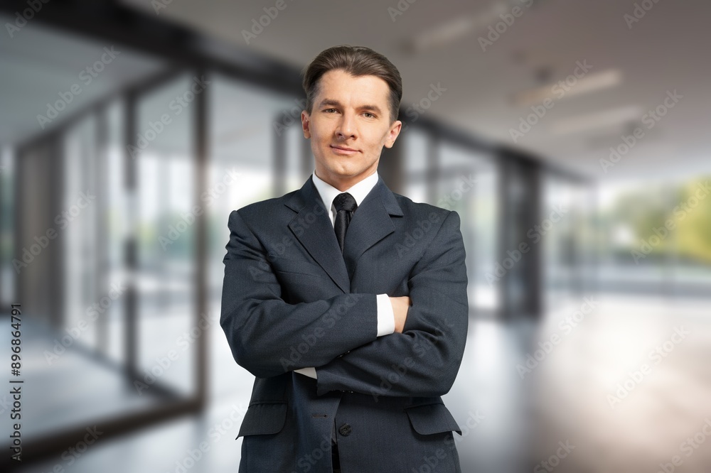 Portrait of successful smart businessman in office Portrait of successful smart businessman in office