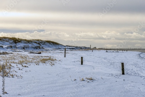 Obraz na płótnie snow covered North Sea beach in Saint Peter Ording w salonie