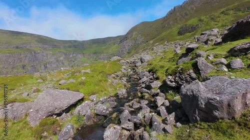 Flying thru the tent to reveal beautiful lake in mountains photo