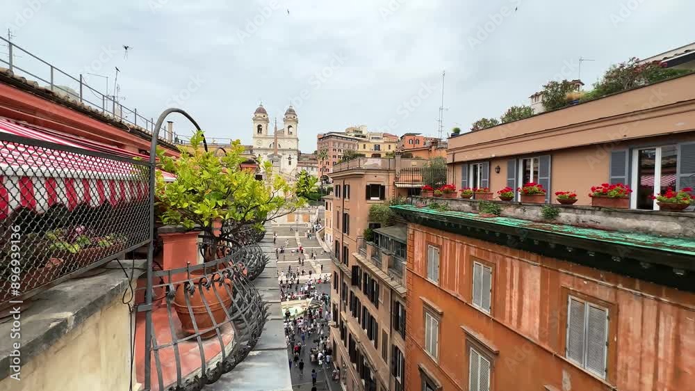 View Of Tourists Visiting Trinita Dei Monti And Spanish Steps From A Rooftop In Rome, Italy. View Of Tourists Visiting Trinita Dei Monti And Spanish Steps From A Rooftop In Rome, Italy.