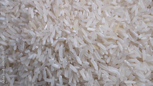 top view close up shot of pile of spinning white rice