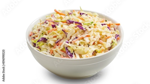A close-up of a bowl filled with a fresh, colorful coleslaw salad.