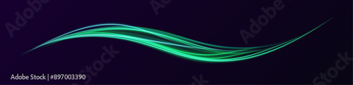 Lights and stripes of green color move quickly against a dark background. Magic of moving fast lines. Laser beams, horizontal light rays. Particle motion effect.	