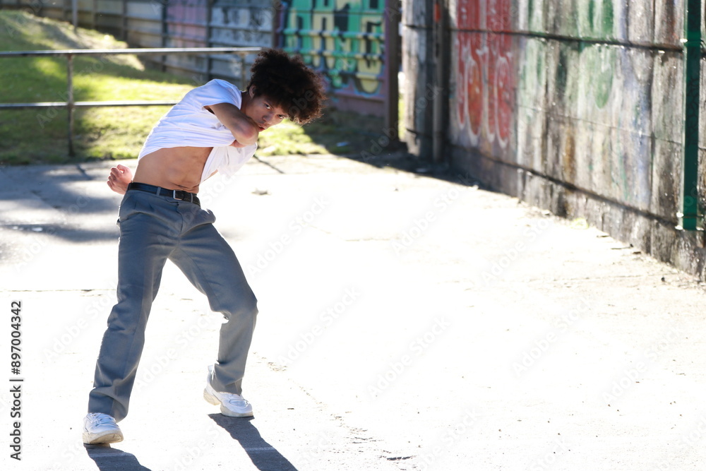 young man dancing on the street urban dance young man dancing on the street urban dance