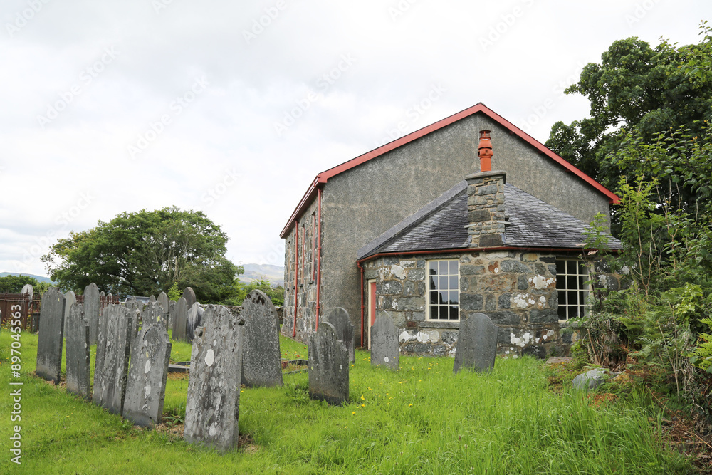 A view of the church Capel yr Annibynwy from across the graveyard in Brithdir, Gwynedd, Wales, UK. A view of the church Capel yr Annibynwy from across the graveyard in Brithdir, Gwynedd, Wales, UK.
