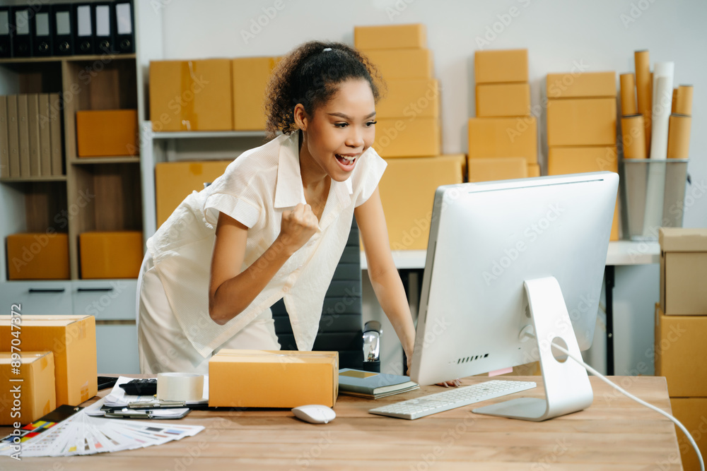 Startup small business SME, Entrepreneur owner woman using smartphone or tablet taking receive Startup small business SME, Entrepreneur owner woman using smartphone or tablet taking receive