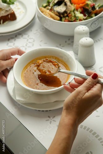 Harira – traditional Moroccan thick tomato lentils soup, Kosher Menu at the restaurant photo